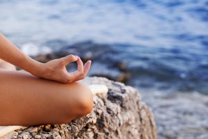 Person meditating.