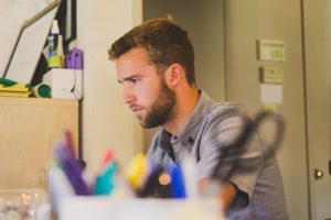 Student having a simple partial seizure. He looks to be deep in thought.